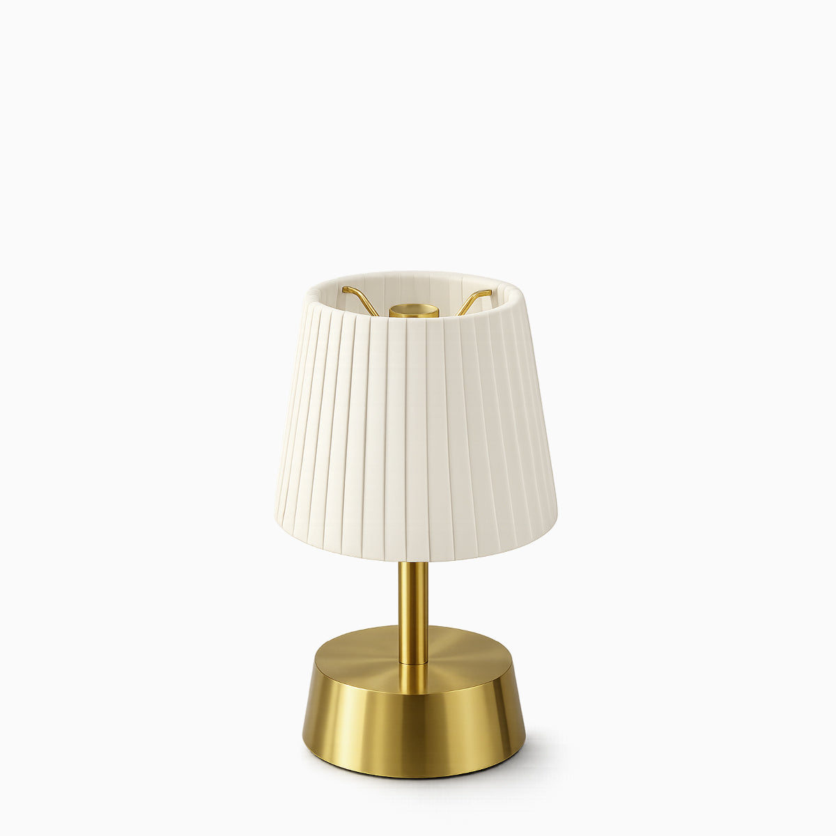 Cordless table lamp with ivory pleated shade and brass base on a white background