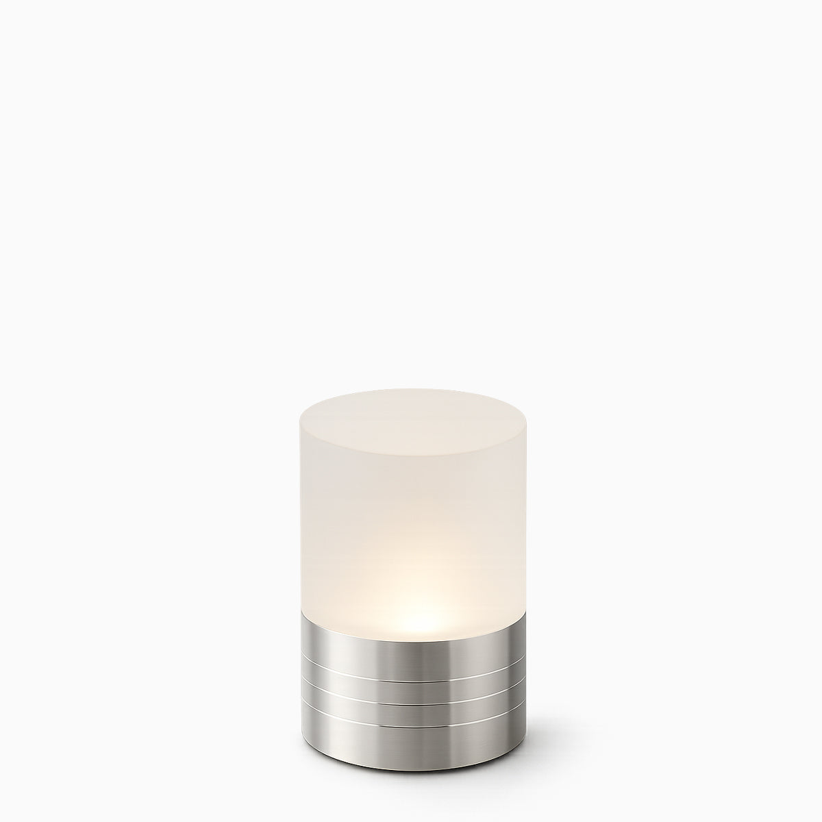 Small cylindrical cordless light with frosted glass shade and metallic silver base on a white background