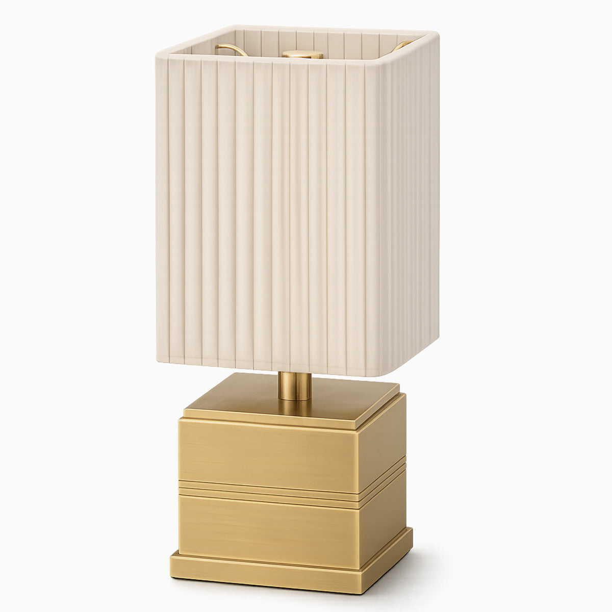 Cordless table lamp with ivory pleated shade and gold base on a white background