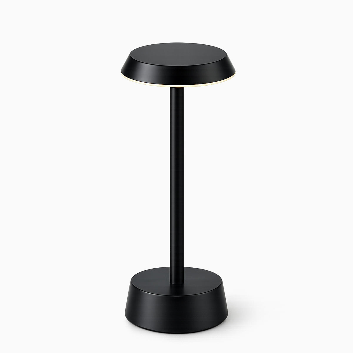 Black cordless lamp with a minimalist design on a white background