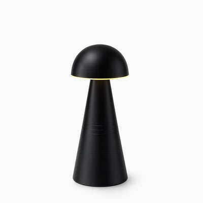 Black cordless table lamp with a white background