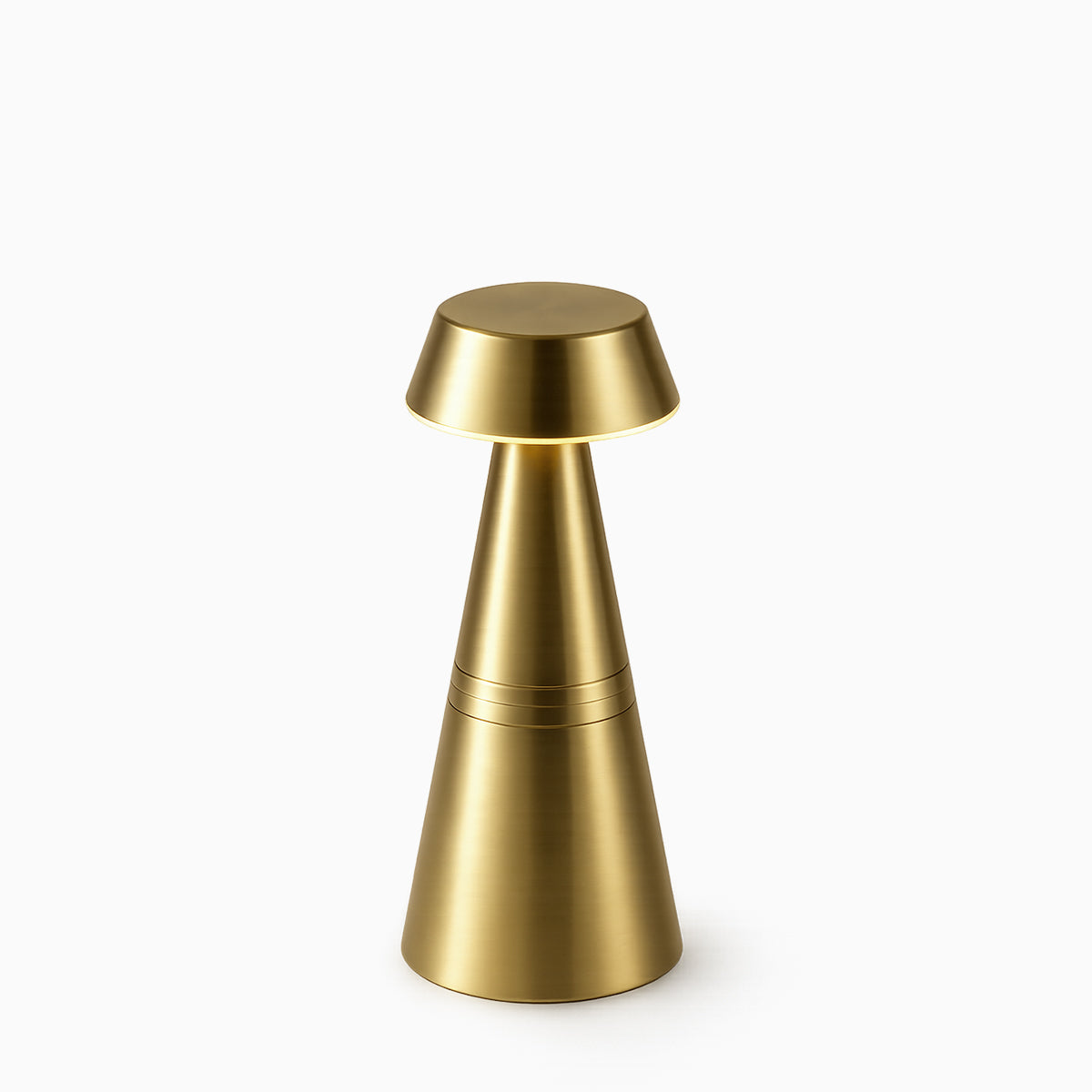 Gold cordless lamp on a white background