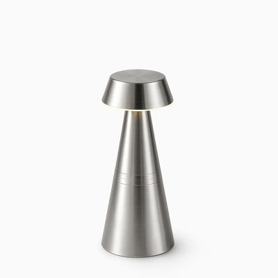 Silver cordless lamp on a white background