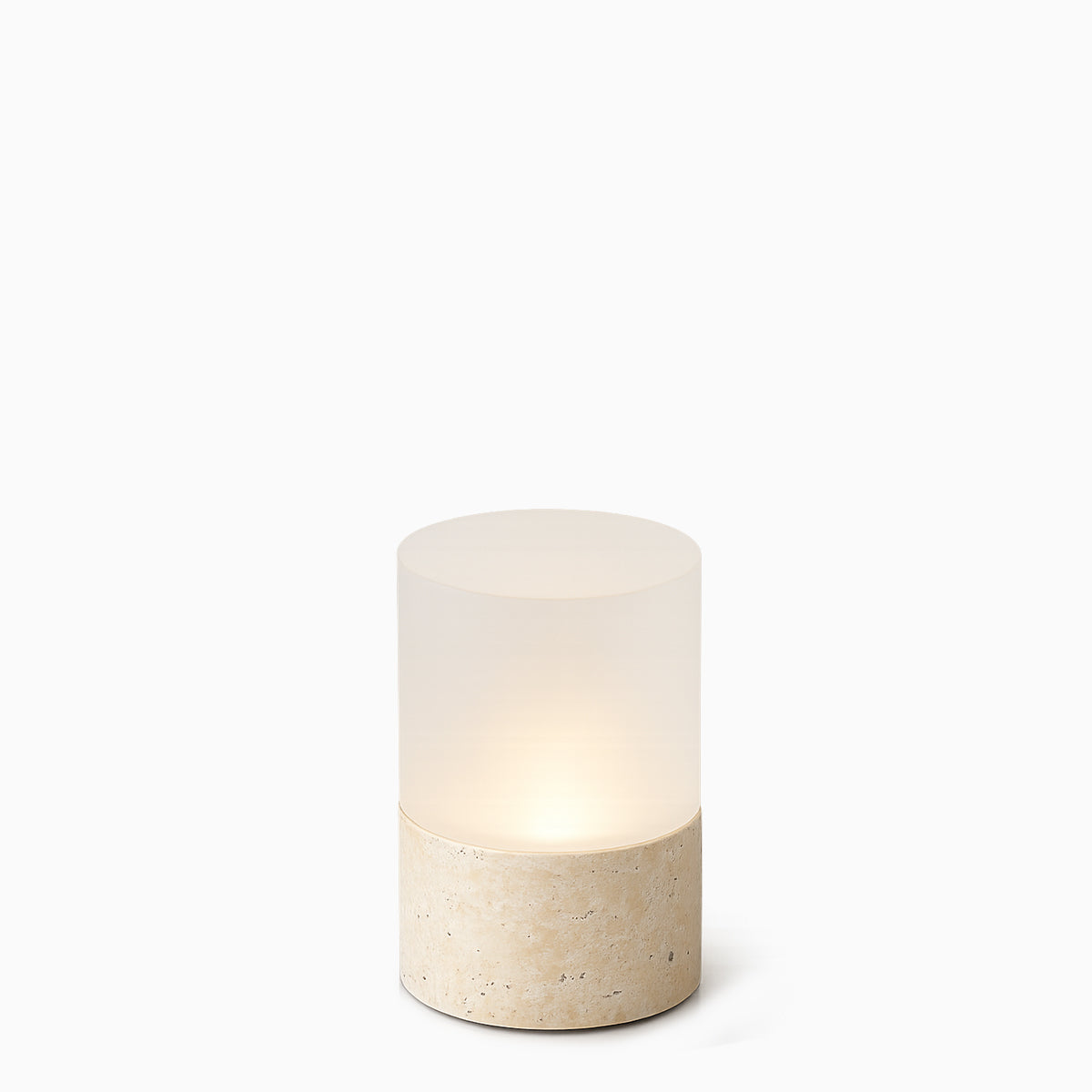 Cylindrical cordless light fixture with a stone base on a white background
