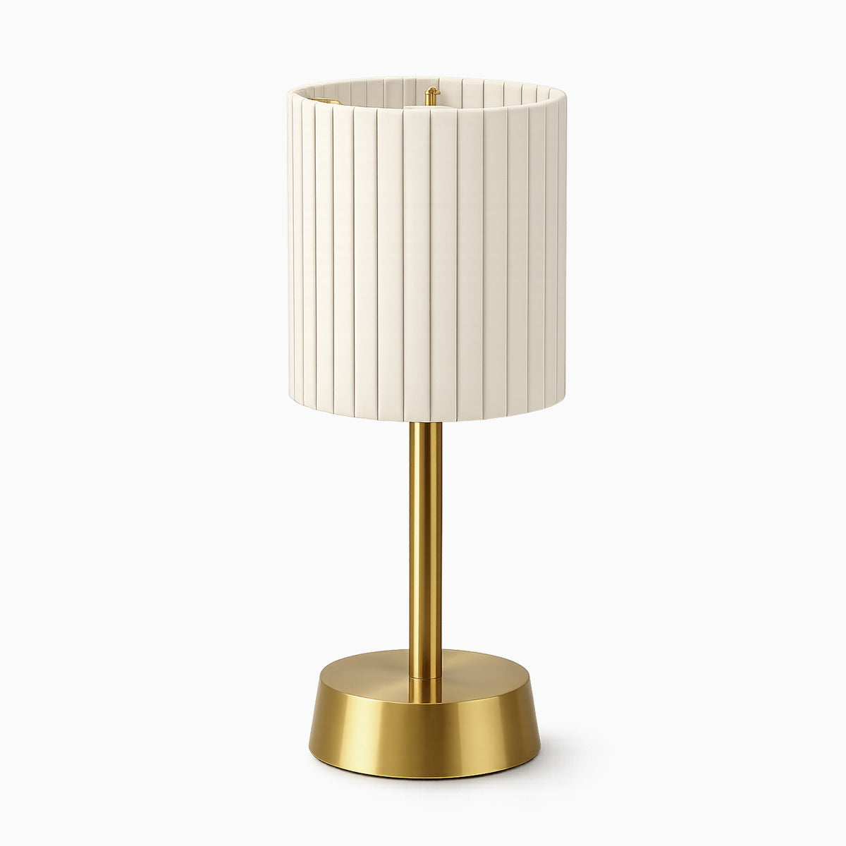 Cordless table lamp with a ivory pleated shade and brass base on a white background