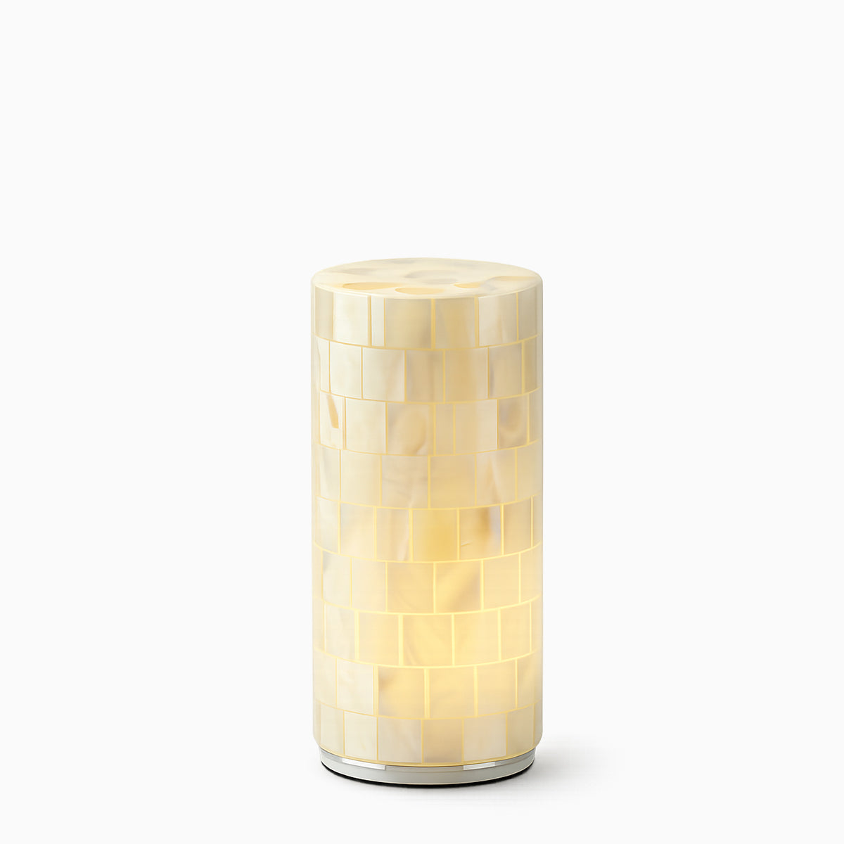 Decorative cylindrical cordless light with mosaic shell pattern on a white background