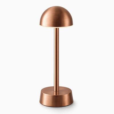 Copper cordless table lamp on a white background