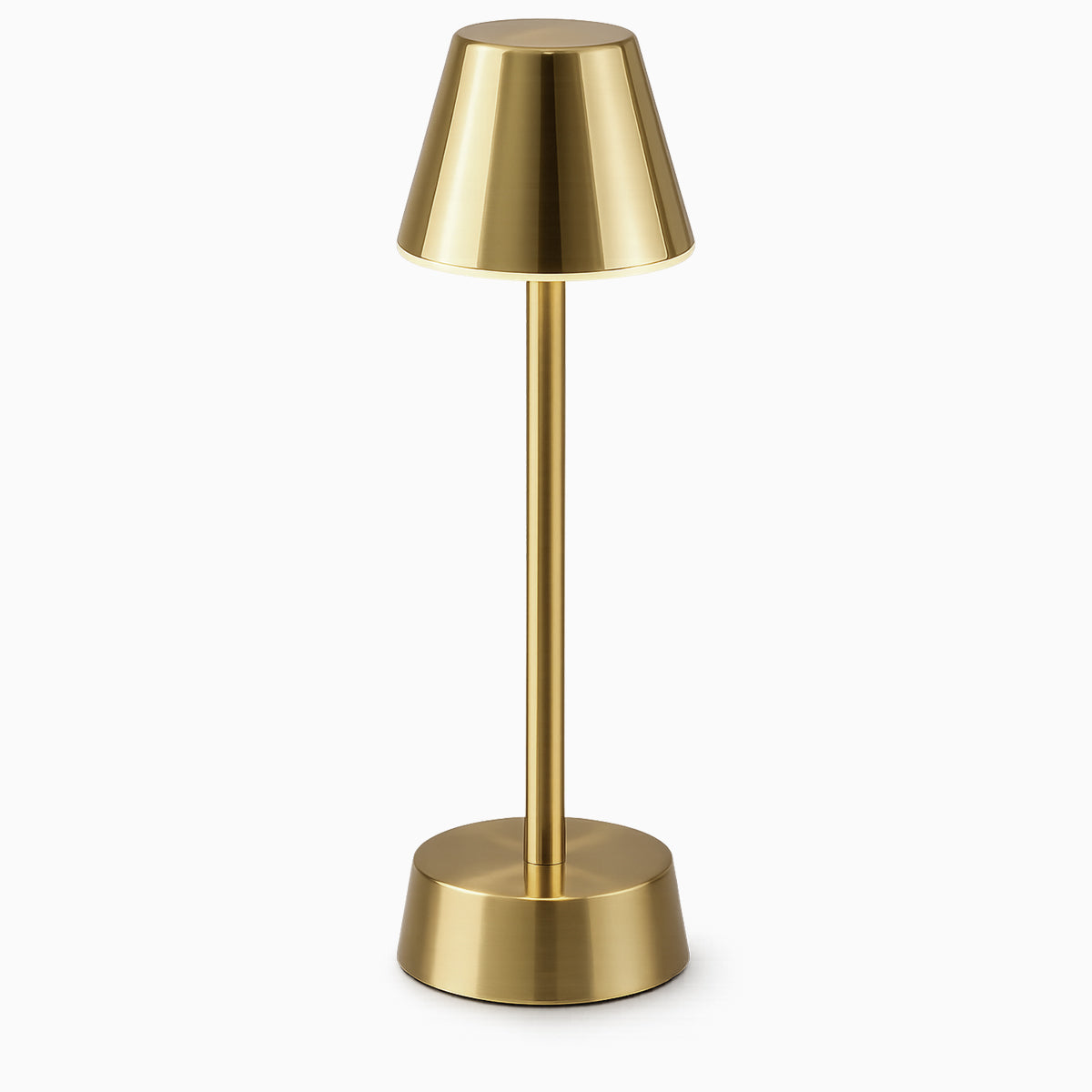Brass cordless table lamp on a white background