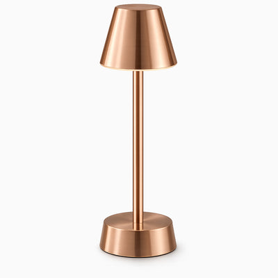 Copper cordless table lamp on a white background