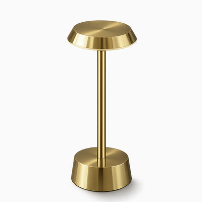 Brass cordless lamp on a white background